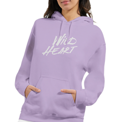 Woman in lavender hoodie with bold white Wild Heart slogan.
