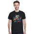 Cat DJ graphic T-shirt on a man featuring a colorful cat at turntables with paint-splatter background on black cotton.