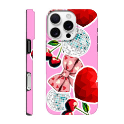 Pink iPhone case featuring sticker-style cherry, bow, disco ball, and red heart graphics in Y2K aesthetic.