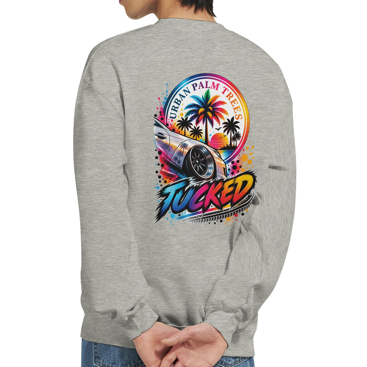 Grey sweatshirt back featuring colorful "Tucked" modified car graphic with palm trees and Urban Palm Trees text.