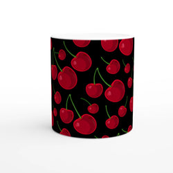Black ceramic mug featuring a retro pattern of glossy red cherries with green stems for daily coffee or tea.