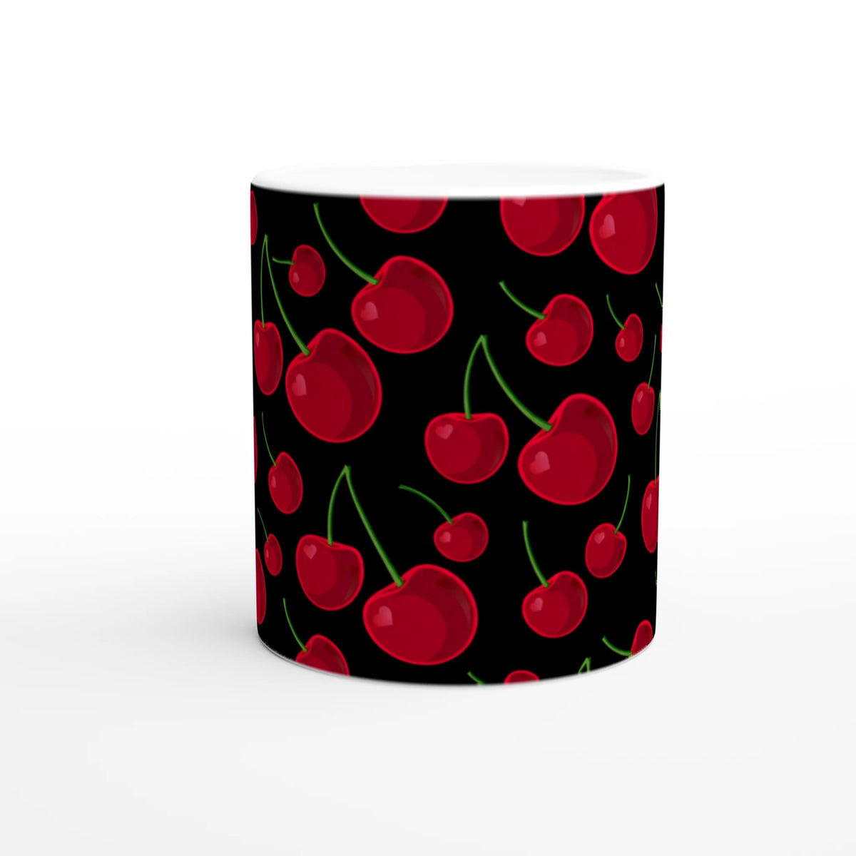 Black ceramic mug featuring a retro pattern of glossy red cherries with green stems for daily coffee or tea.