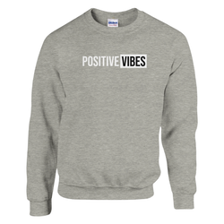 Light gray women's sweatshirt with POSITIVE VIBES graphic in white letters inside a black box.
