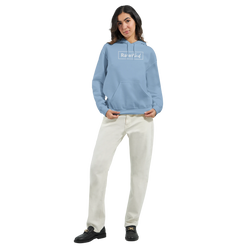Woman wearing light blue hoodie with Rare Find logo, front pouch pocket, double-lined hood.