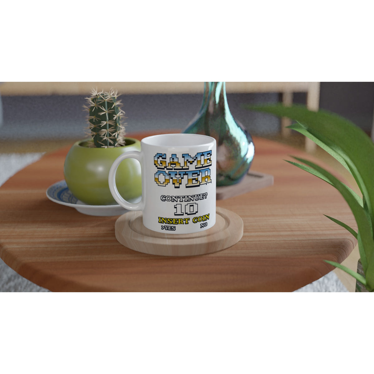 11 oz glossy white mug with pixel GAME OVER design and INSERT COIN on wooden table.