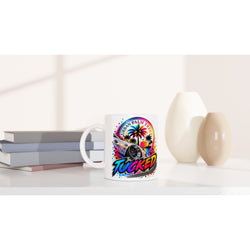 Tucked Petrolhead mug featuring a lowered car and Urban Palm Trees sunset graphic on a white coffee cup.