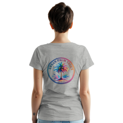 Back view of a woman wearing a gray vintage palm tree graphic tee with a circular rainbow palm design.