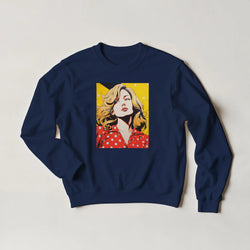 Navy blue sweatshirt featuring a retro pop art print of a blonde woman in a red polka dot top against a yellow background.