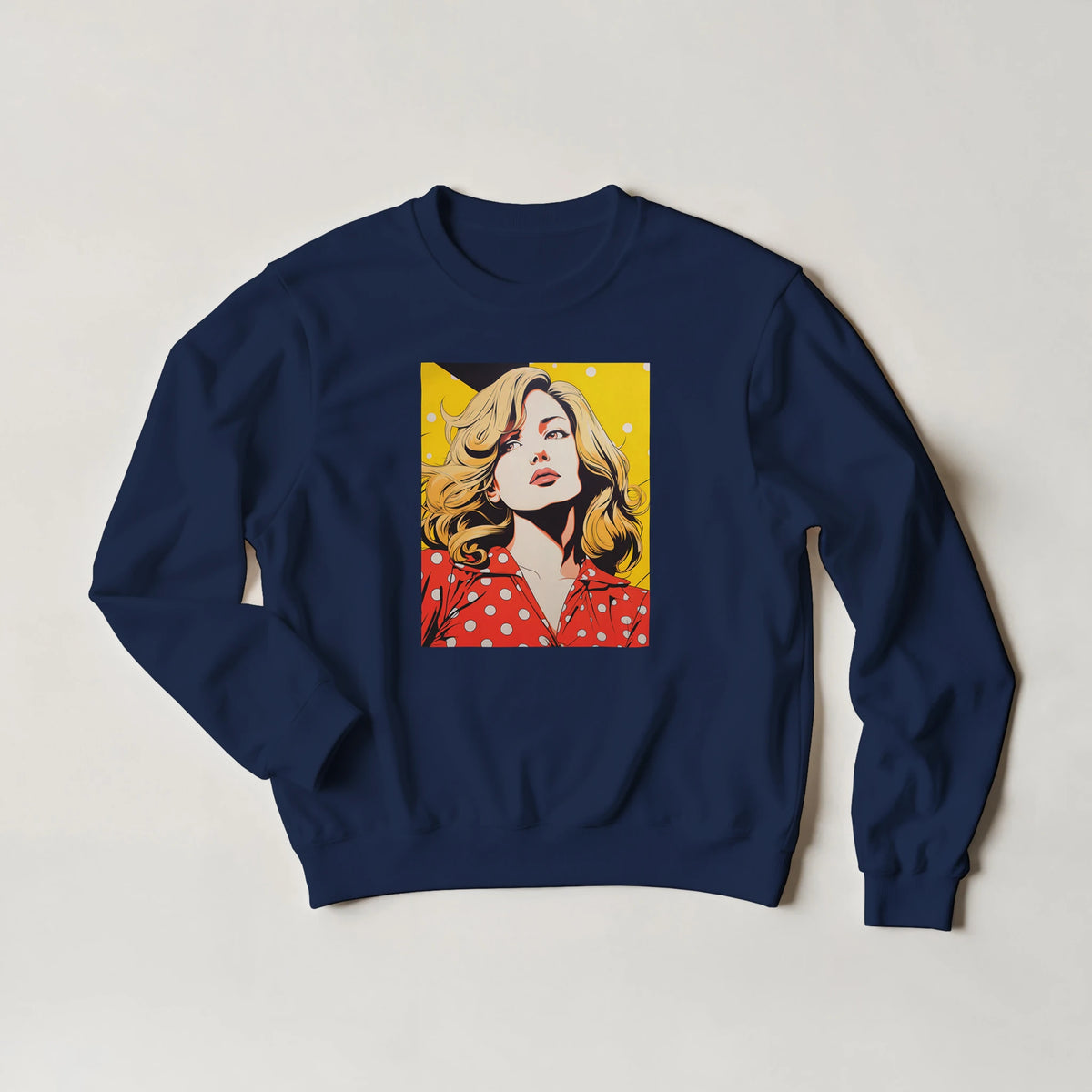Navy blue sweatshirt featuring a retro pop art print of a blonde woman in a red polka dot top against a yellow background.