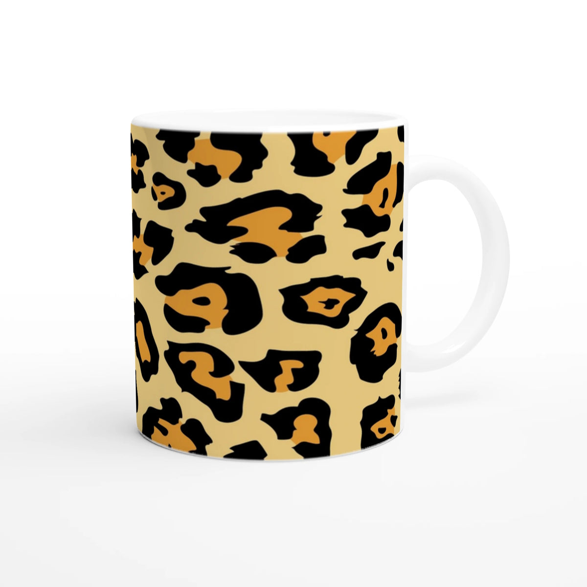 Classic leopard print mug with tan, black, and orange spots for a bold retro, streetwear-inspired coffee cup.