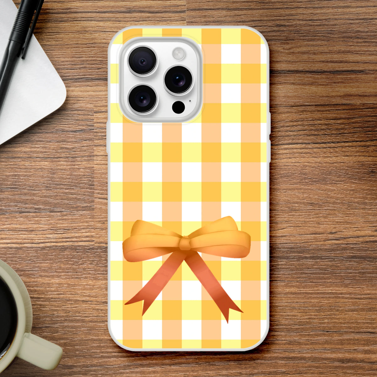 Yellow gingham bow iPhone case for 13-15, cute coquette aesthetic.