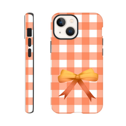 Orange gingham iPhone case with a yellow bow design. Cute coquette check pattern tough cover for impact resistance and daily protection.