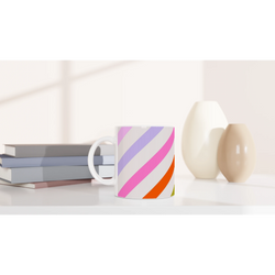 Pastel diagonal stripe ceramic mug with rainbow colors, ideal for coffee or tea at home, office, or dorm.