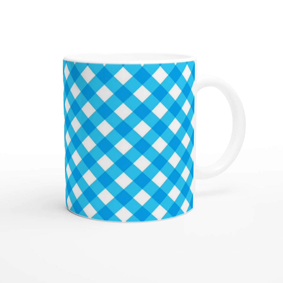 Blue gingham ceramic mug with white interior and curved handle.