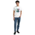 Male model wearing a white Panda DJ graphic T-shirt with colorful splash artwork.