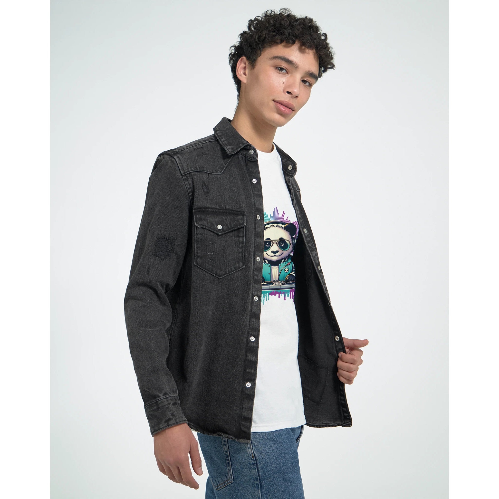 Male model in white Panda DJ graphic tee with panda art, layered under a black denim jacket.
