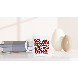 White ceramic mug with red 'Coffee & Chill' slogan and 'Breathe, Taste, Enjoy' beside books.