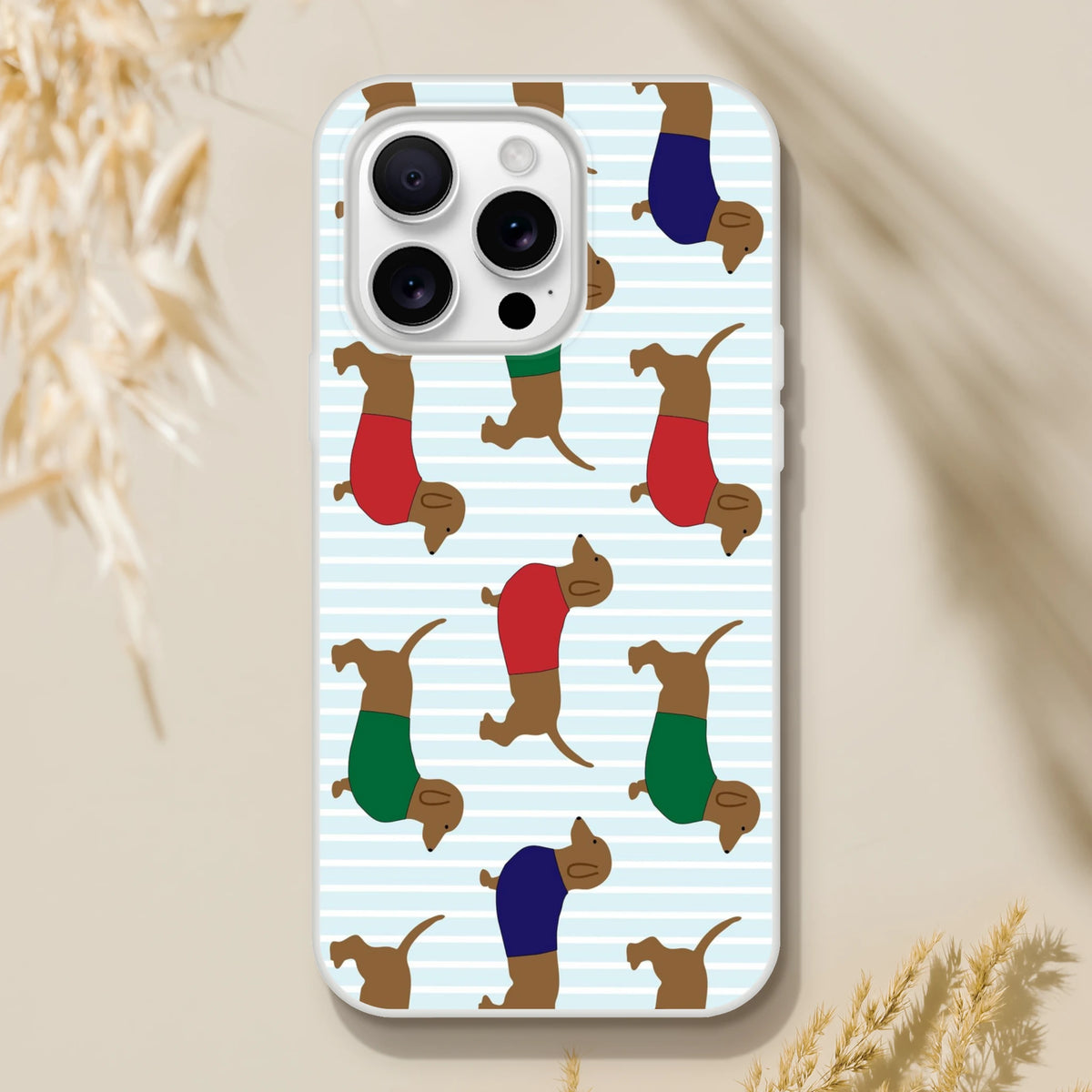 Cute sausage-dog iPhone case for iPhone 13-16, slim matte shell with blue-striped dachshund pattern.