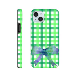 Green gingham iPhone case featuring a purple polka dot bow print, designed for a cute coquette streetwear aesthetic on tough protection.