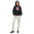 Woman wearing black 50/50 cotton-poly Cowgirl hoodie with pastel graphic and front pocket.