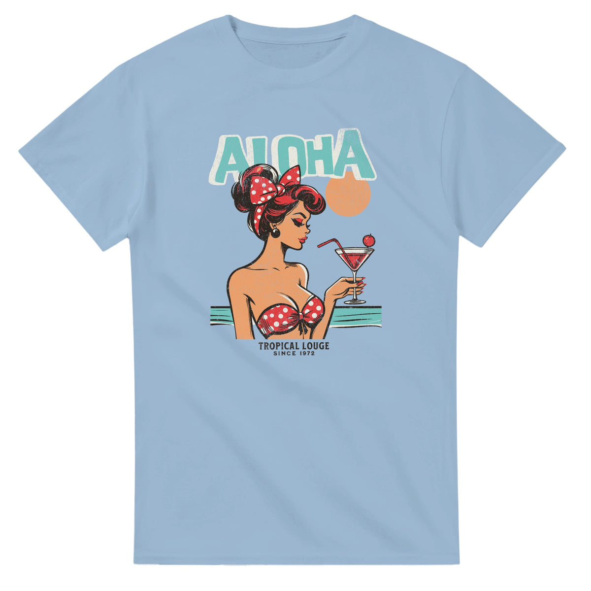 Retro Aloha graphic tee featuring a pin-up woman in red polka-dot bikini holding a cocktail on a light blue shirt.