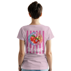 Back view of woman wearing pink graphic tee featuring retro striped red apple fruit print and Urban Palm Trees logo.