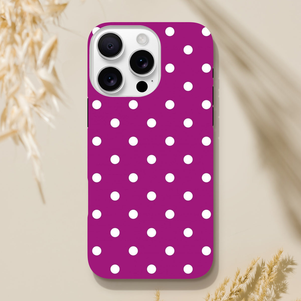 Purple and white polka dot tough iPhone case for models 13-16. Cute, shock-absorbing TPU phone cover with dual-layer rugged protection.