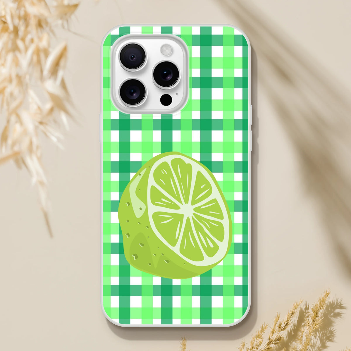 Lime gingham iPhone case with green checkered pattern and lime slice graphic for 13-16 models