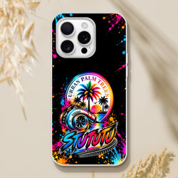 Colorful turbo car culture iPhone case featuring a metallic turbocharger, rainbow palm trees, and vibrant paint splatters on a black background.