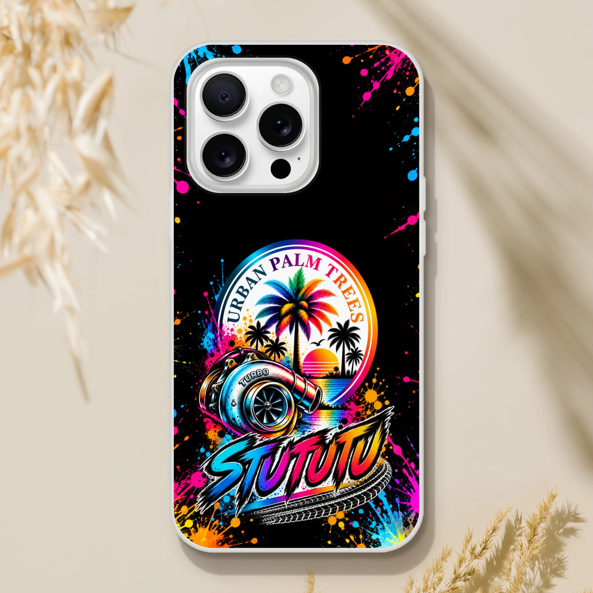 Colorful turbo car culture iPhone case featuring a metallic turbocharger, rainbow palm trees, and vibrant paint splatters on a black background.