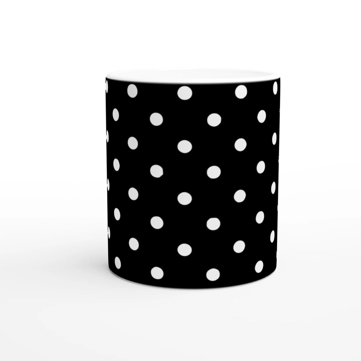 Black and white polka dot ceramic mug with vintage charm for coffee or tea. Cute spotty design fits daily use, office, or gifting.