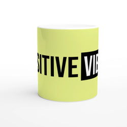 Cute Positive Vibes Mug in lime ceramic with bold black POSITIVE VIBES wraparound text.