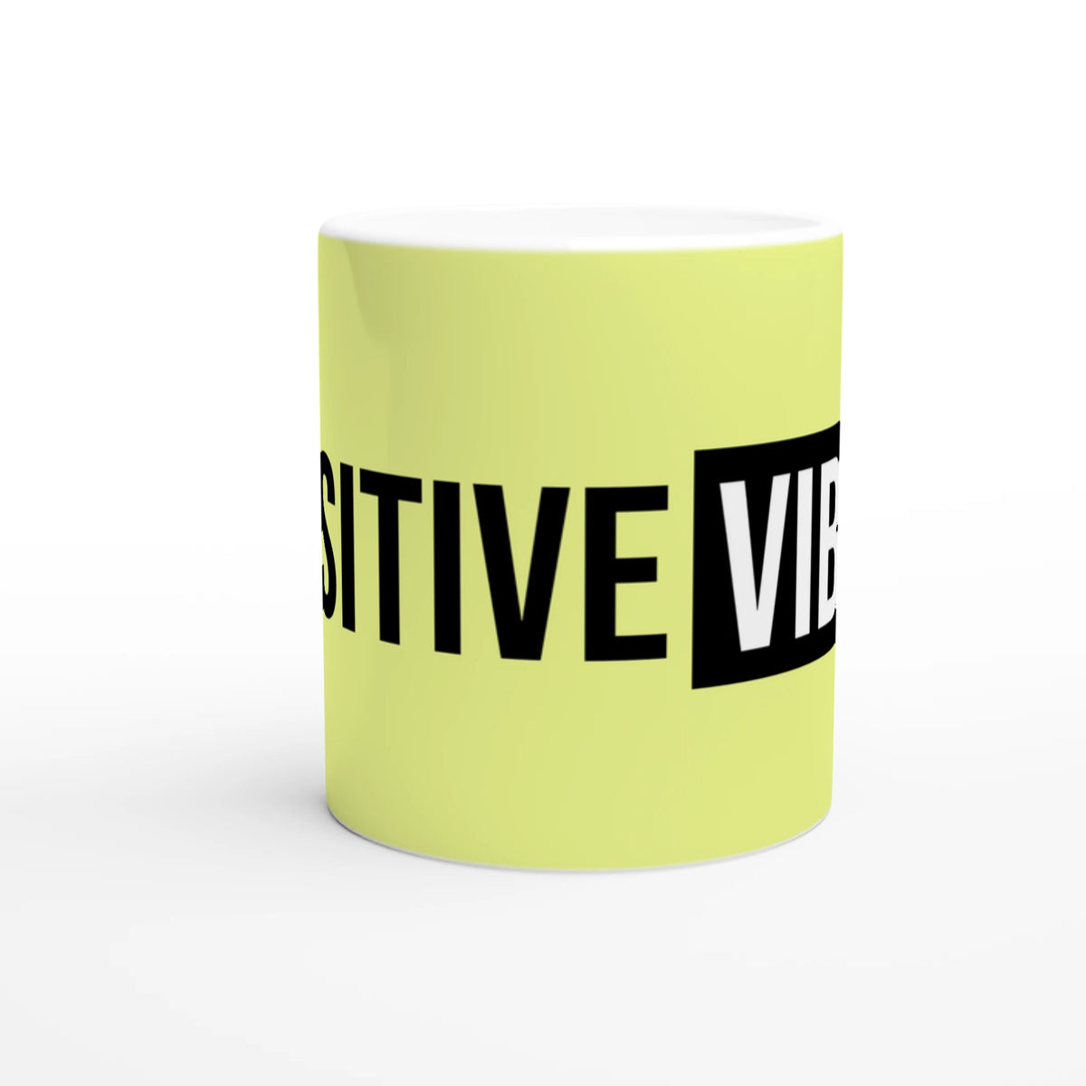 Cute Positive Vibes Mug in lime ceramic with bold black POSITIVE VIBES wraparound text.