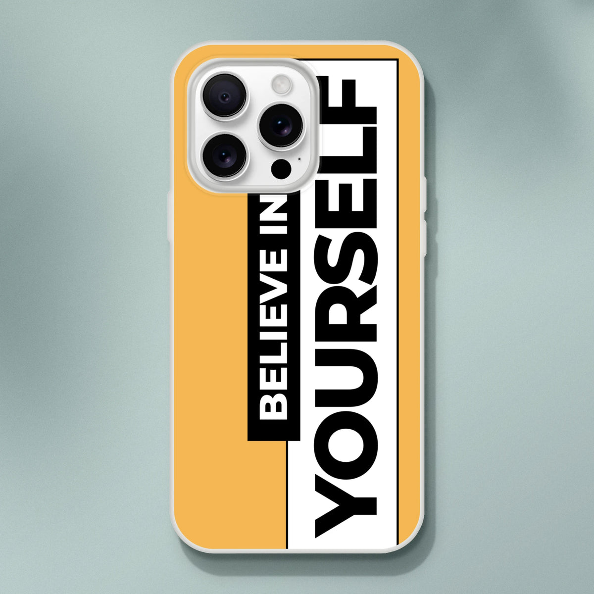 Yellow iPhone case for iPhone 13-16 with bold vertical Believe In Yourself slogan and matte finish.