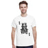 Man wearing white T-shirt featuring crowned skull king graphic and KING lettering.