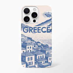 Vintage Greece tough iPhone case featuring a blue and cream Mediterranean coastal village illustration with bold typography and airmail stamp detail.