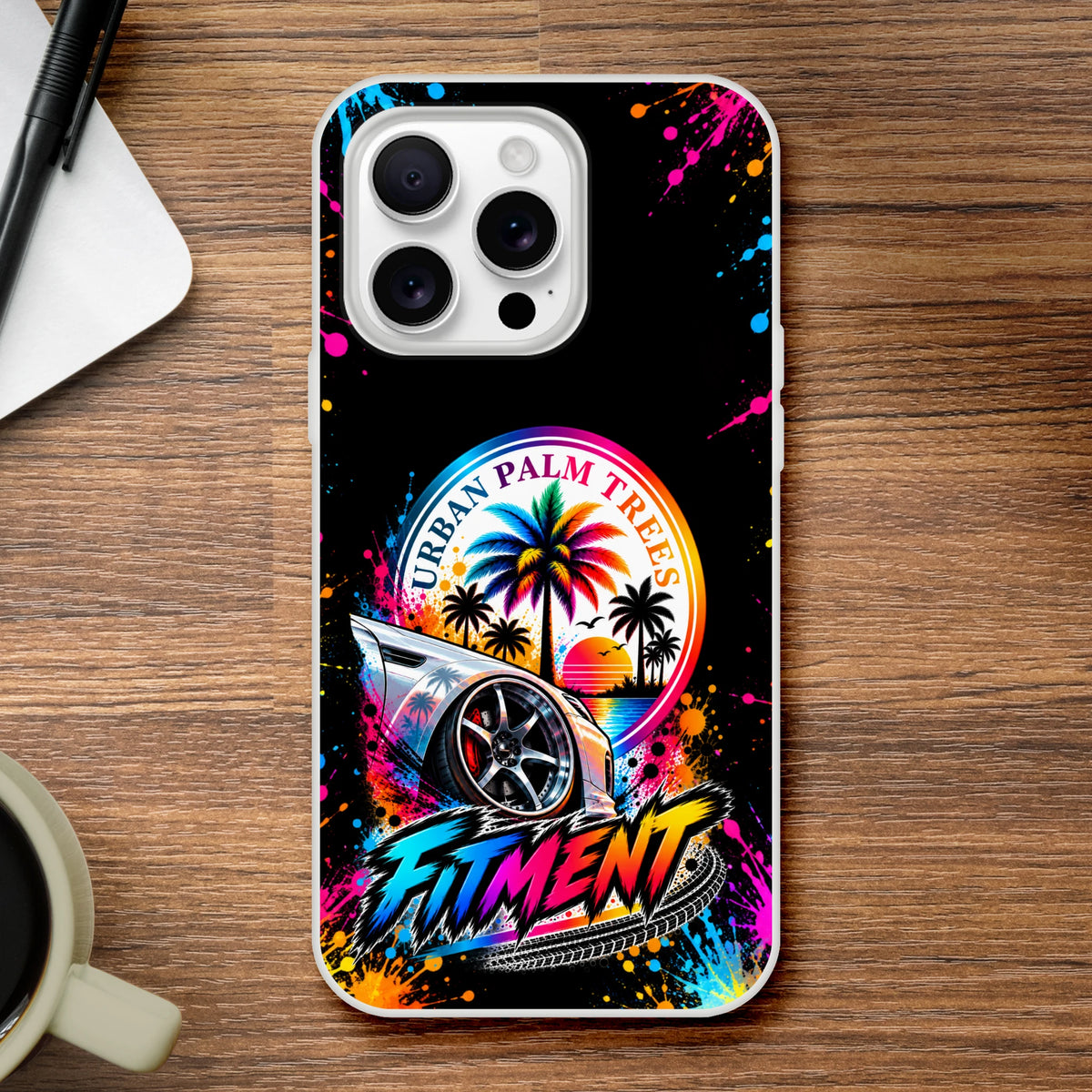 Vibrant Fitment phone case featuring a lowered car, palm trees, and colorful splatter art against a black background.
