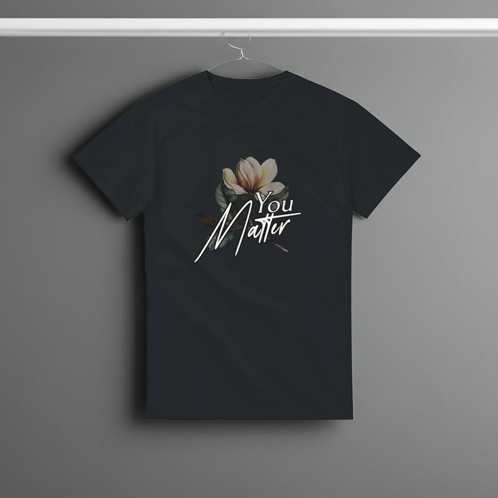 Black t-shirt with floral design and 'You Matter' text on a gray background