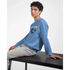 Model wearing blue cotton-poly blend men's graphic sweatshirt with teddy bear design and 'Wanted' text.