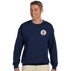 Man wearing navy sweatshirt featuring colorful circular Urban Palm Trees graphic logo on the chest.