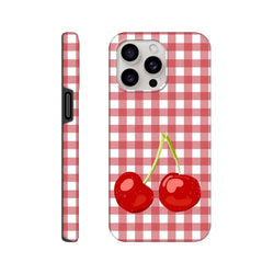 Red and white gingham iPhone case featuring two glossy red cherries. Tough checkered cover for drop protection.