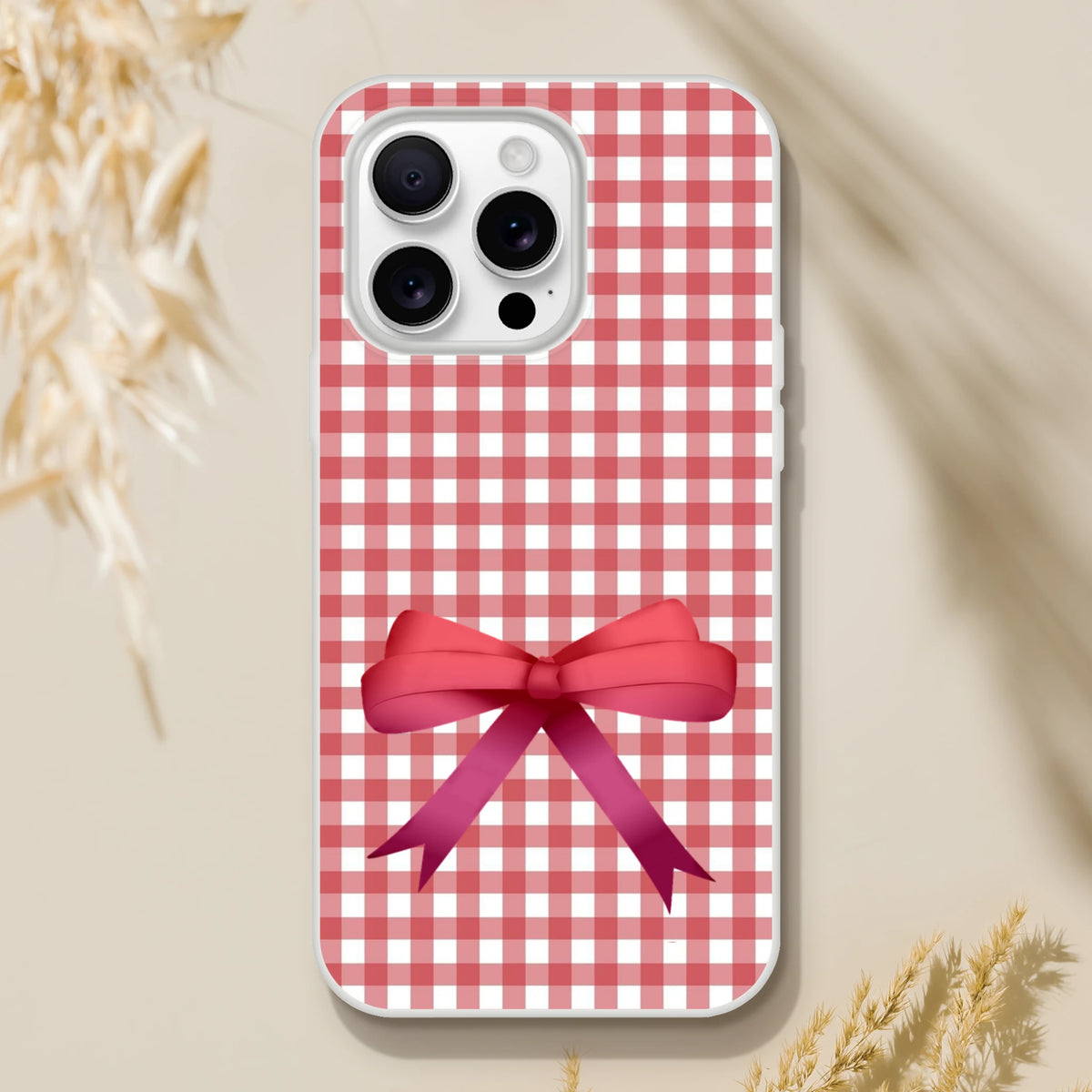 Red gingham bow iPhone case (13-16) in a cute coquette aesthetic with slim, protective design.