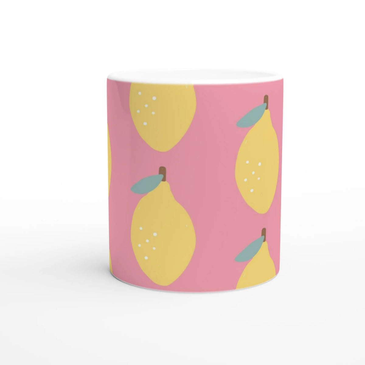 Pink ceramic mug with yellow lemon pattern and teal leaves, a cute citrus-themed coffee cup.