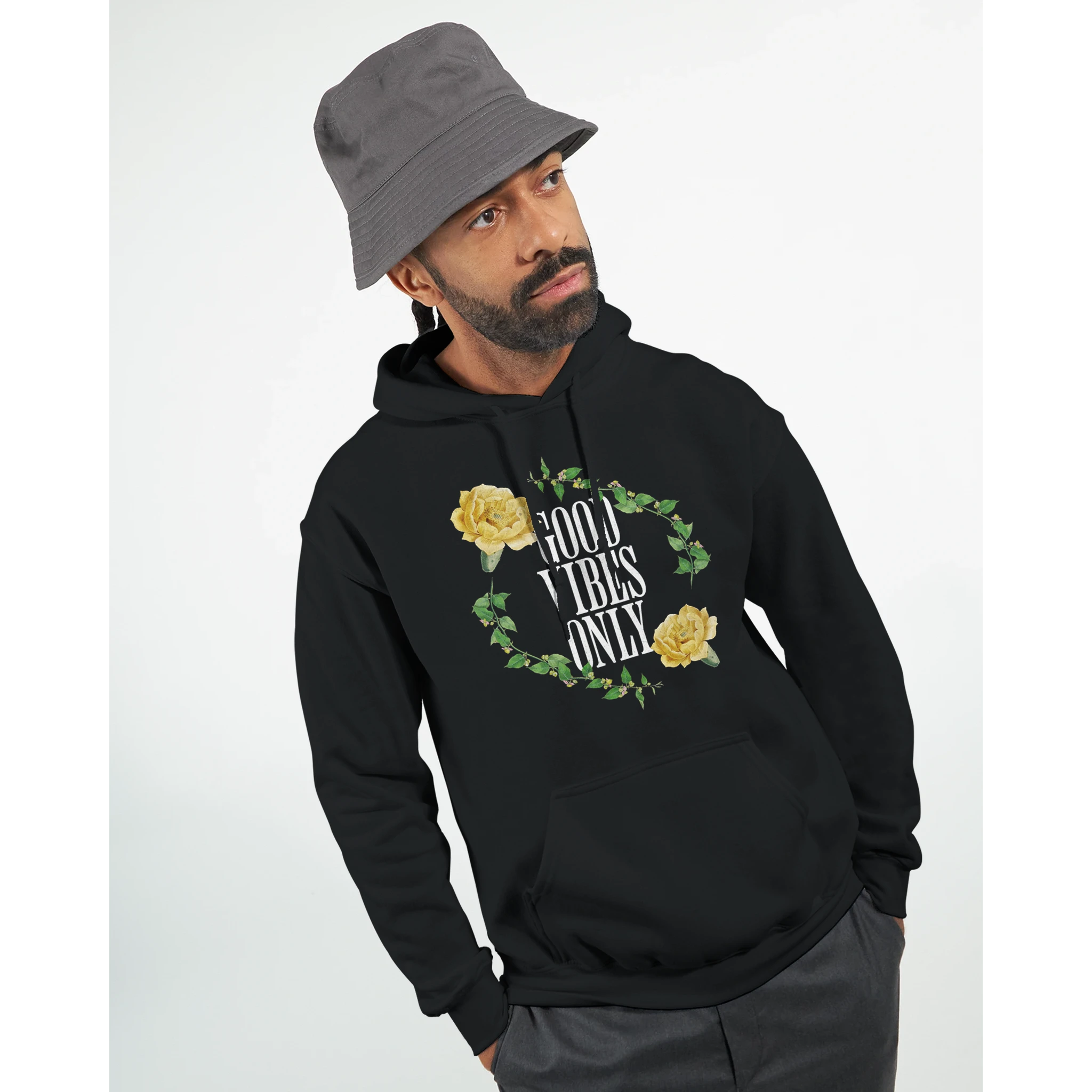 Man wearing men's Good Vibes Only slogan hoodie with floral wreath design.