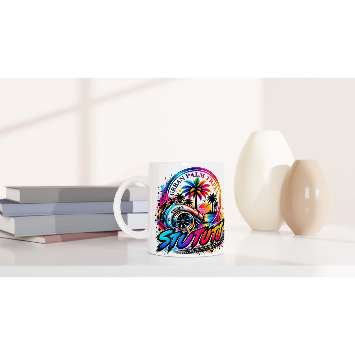 White Turbo Petrolhead Mug featuring a colorful turbocharger and palm tree design on a desk.