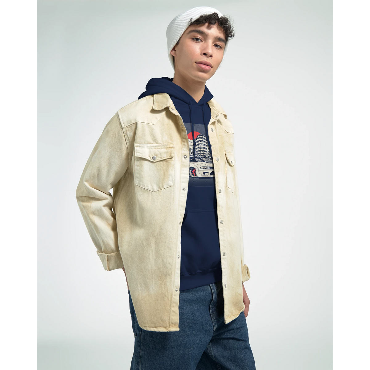 Model wearing Car Jumper JDM Hoodie in navy, 50/50 cotton-polyester blend, layered under a beige overshirt.