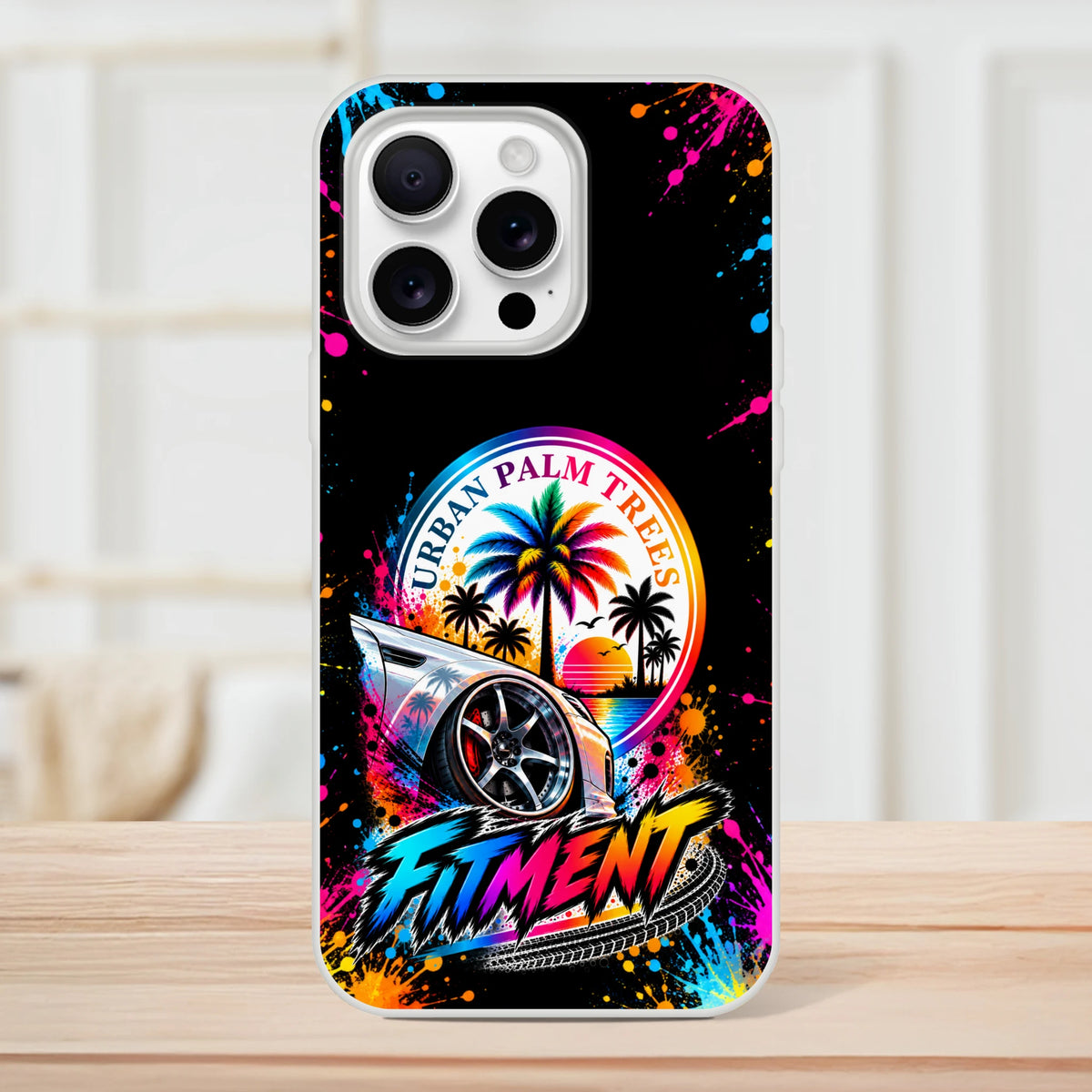 Fitment stance iPhone case featuring lowered car, colorful palm trees, and paint splatter design for petrolheads.