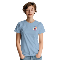 Woman wearing a light blue graphic tee featuring a colorful circular "Urban Palm Trees" logo on the chest.