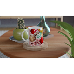 Retro ceramic mug featuring a vintage perfume bottle, floral pattern, and pink coquette bow design on a wooden coast