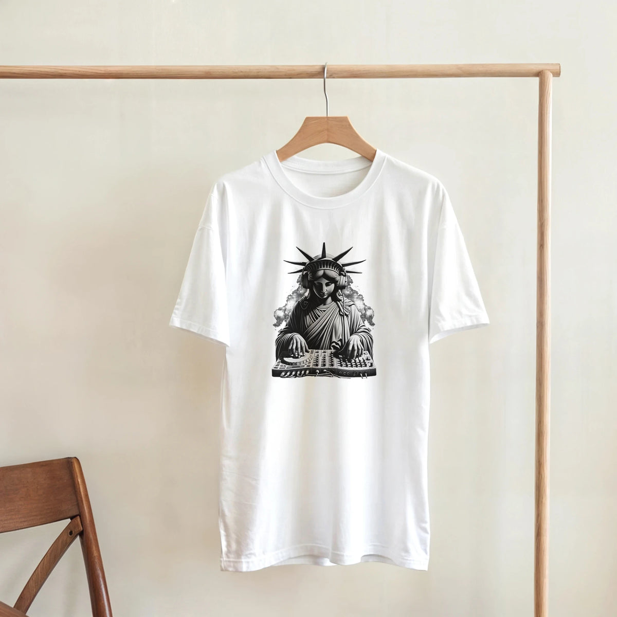 White men's graphic tee featuring Statue of Liberty DJ with headphones mixing on a deck in urban streetwear style.